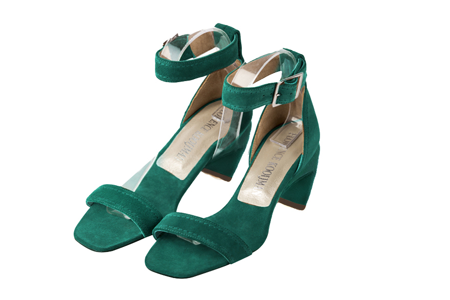 Handcrafted women's comfortable and elegant sandals with a strap around the ankle in premium emerald green leather. Medium comma heels. Square toe. Perfect for women's wedding guest heels, or elevated everyday style. 
                Choose from our luxurious collections of leather and fabric to perfectly match your sandals to your outfits.